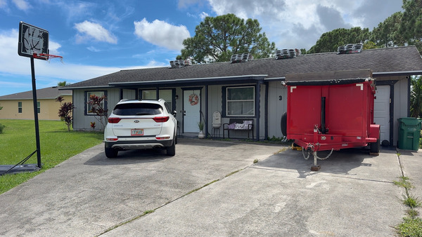 Delivering Trailer For Roofing ContractorS Material Disposal in Port St Lucie FL